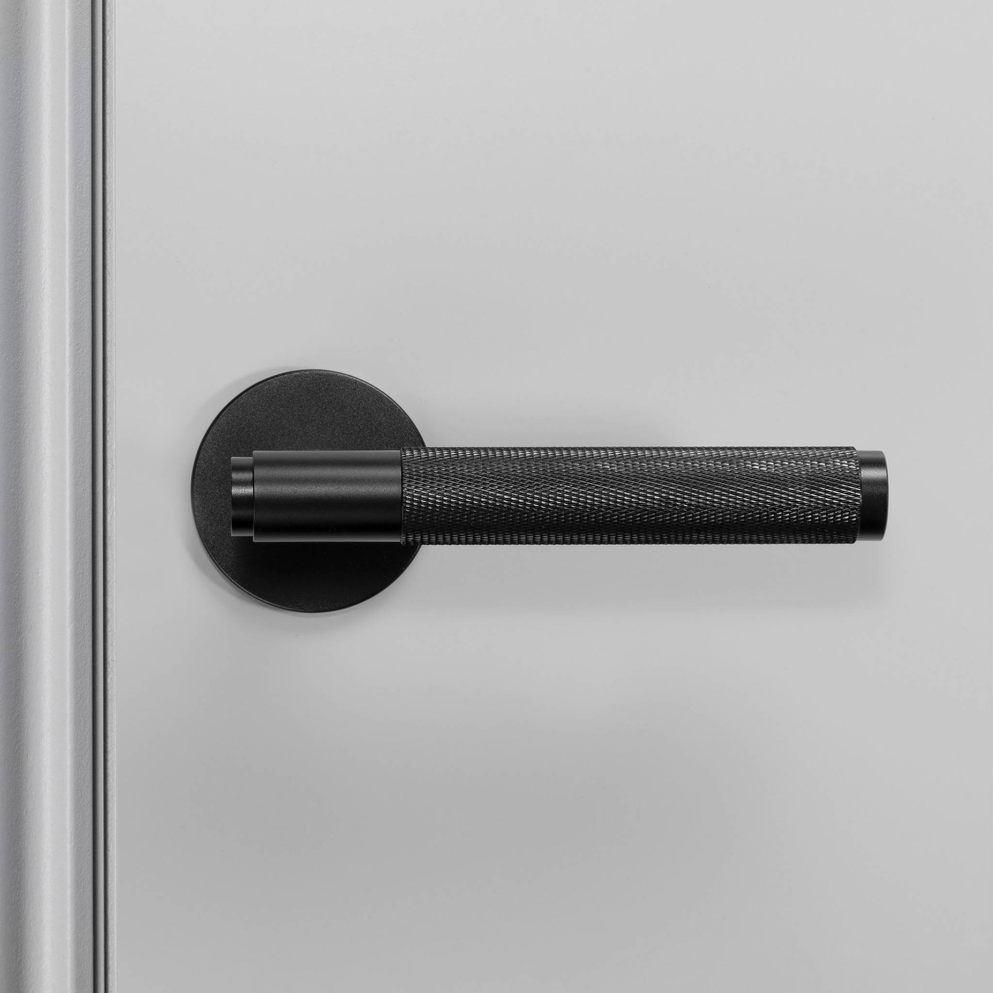 DOOR HANDLE / CROSS / SPRUNG